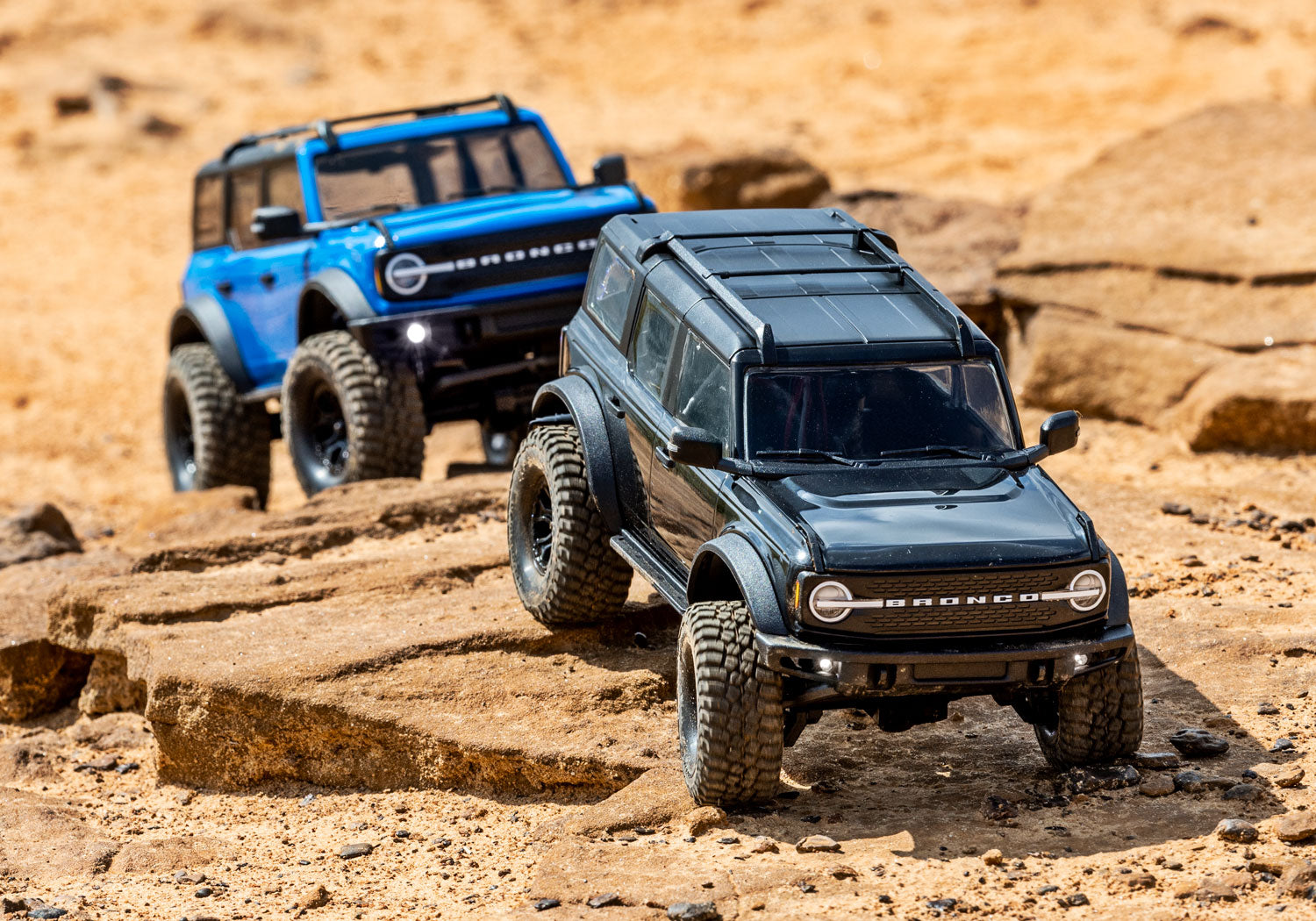 RC Trucks crawling over rocks