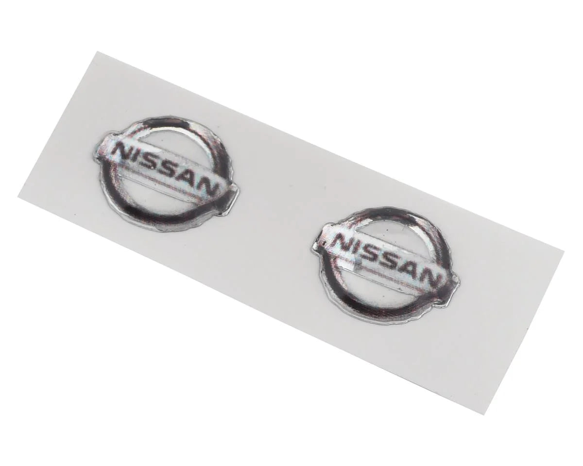 Sideways RC Nissan Badges (2) (Miniature Scale Accessory)